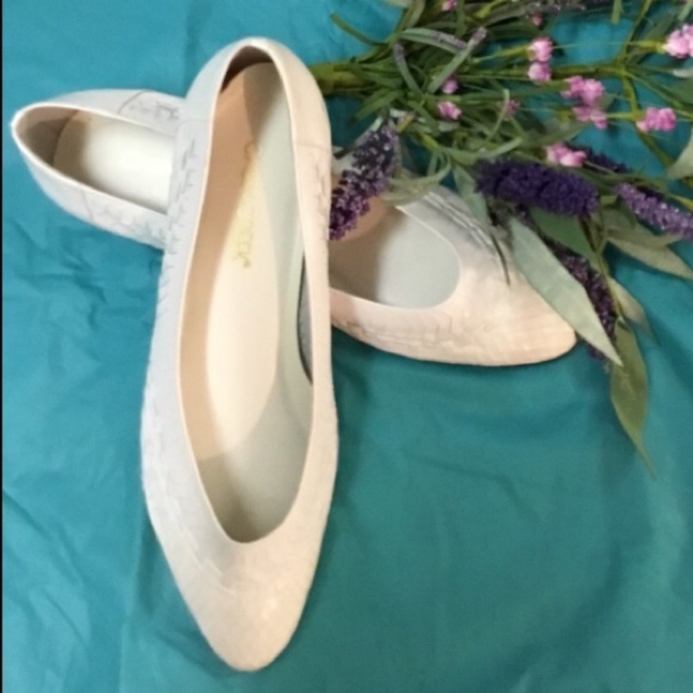 White leather flats